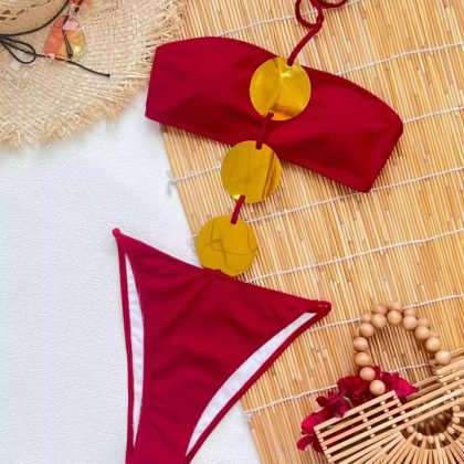Red One piece swimwear with gold pieces